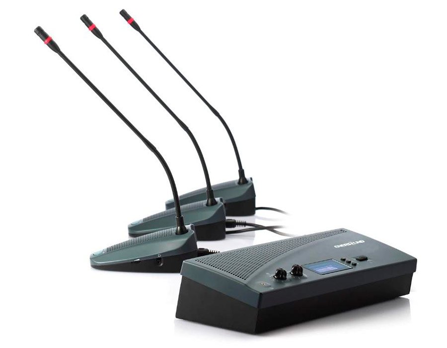 Professional omnidirectional video conference microphone unit centered on a corporate boardroom meeting table by WG Electronic UAE
